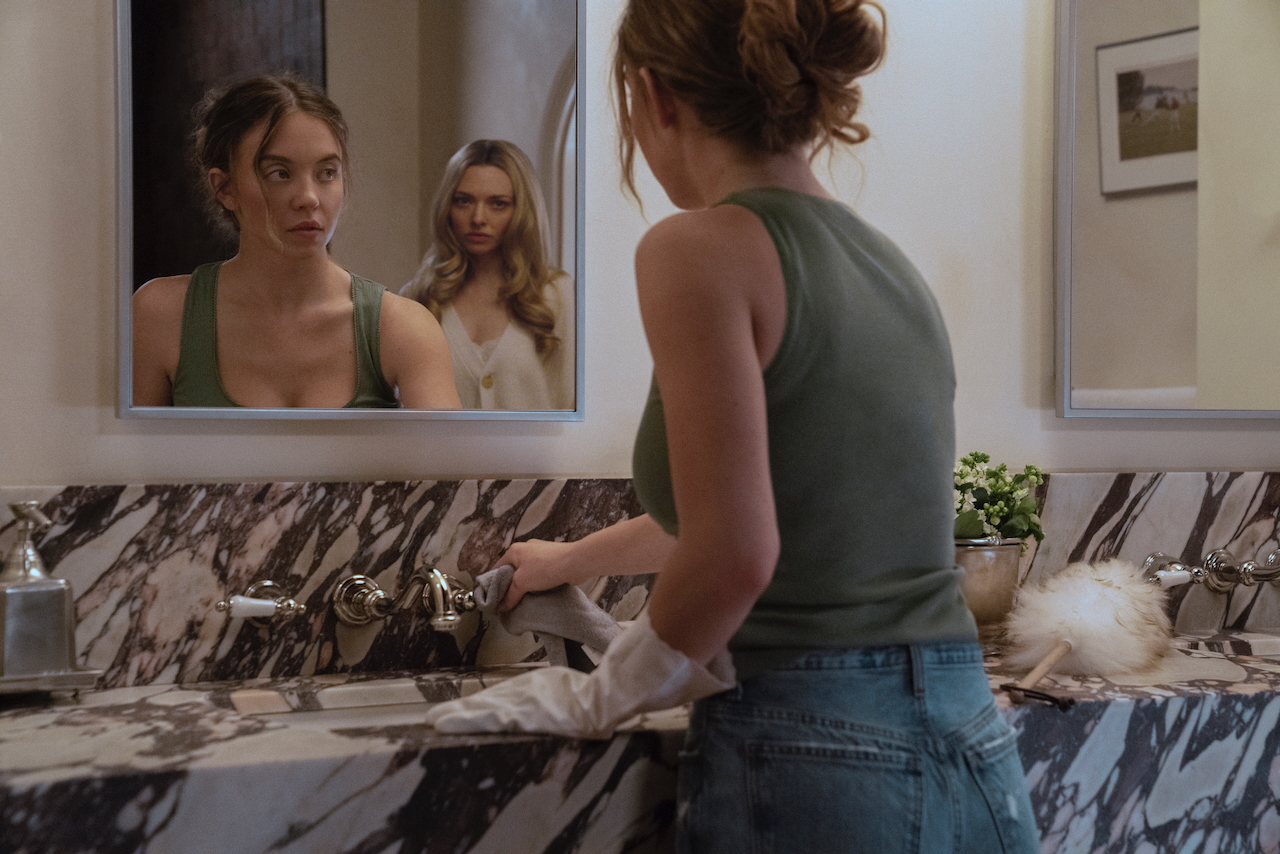Sydney Sweeney as Millie and Amanda Seyfried as Nina in The Housemaid. Photo Credit: Daniel McFadden/Lionsgate