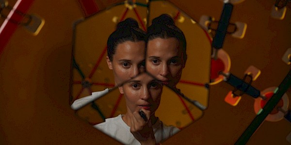 Alicia Vikander in THE ASSESSMENT, a Magnolia Pictures release. Photo credit: Magnus Jønck. © 2024 Number 9 Films Assessment Limited, TA Co-Production GmbH, ShivHans Productions, LLC, TA2022 Investors, LLC, Tiki Tāne Pictures, LLC. Photo courtesy of Magnolia Pictures.