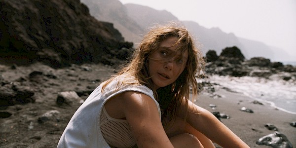 Elizabeth Olsen in THE ASSESSMENT, a Magnolia Pictures release. Photo credit: Magnus Jønck. © 2024 Number 9 Films Assessment Limited, TA Co-Production GmbH, ShivHans Productions, LLC, TA2022 Investors, LLC, Tiki Tāne Pictures, LLC. Photo courtesy of Magnolia Pictures.